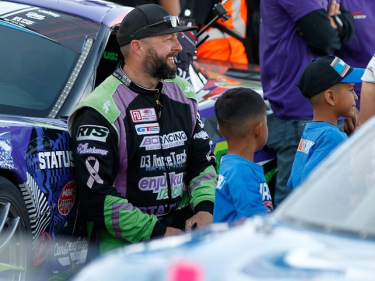 Josh Stuart of Stuart Fam Drifting with fans in the Formula Drift paddock